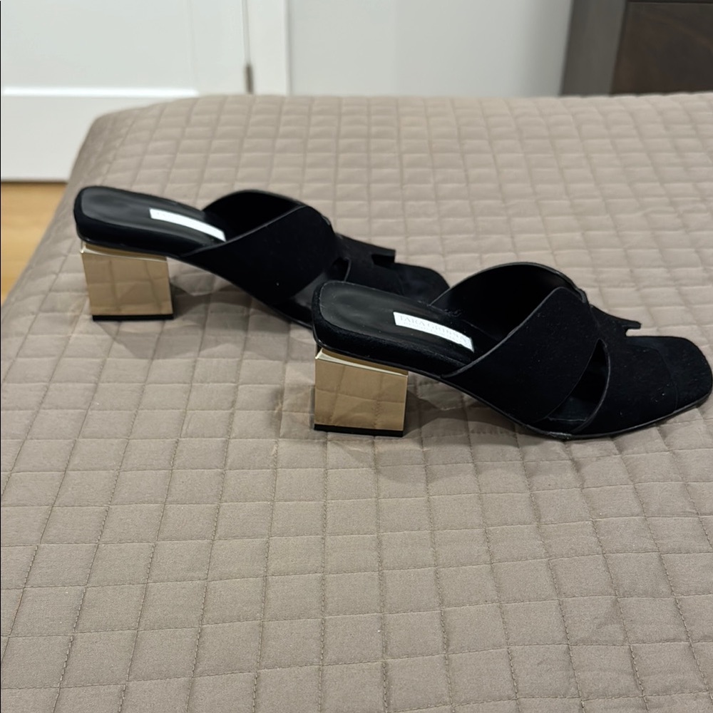 Black and Gold Mules with Geometric Heel. Size 5.5.  Worn once. Too big for me.